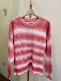 Maglione con treccie