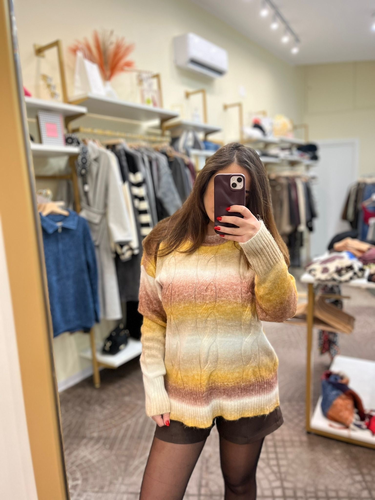 Maglione con treccie