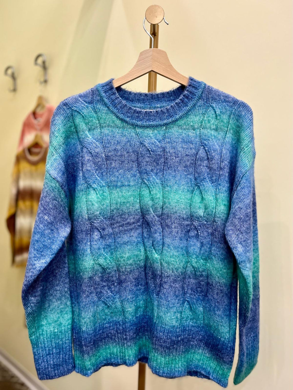 Maglione con treccie